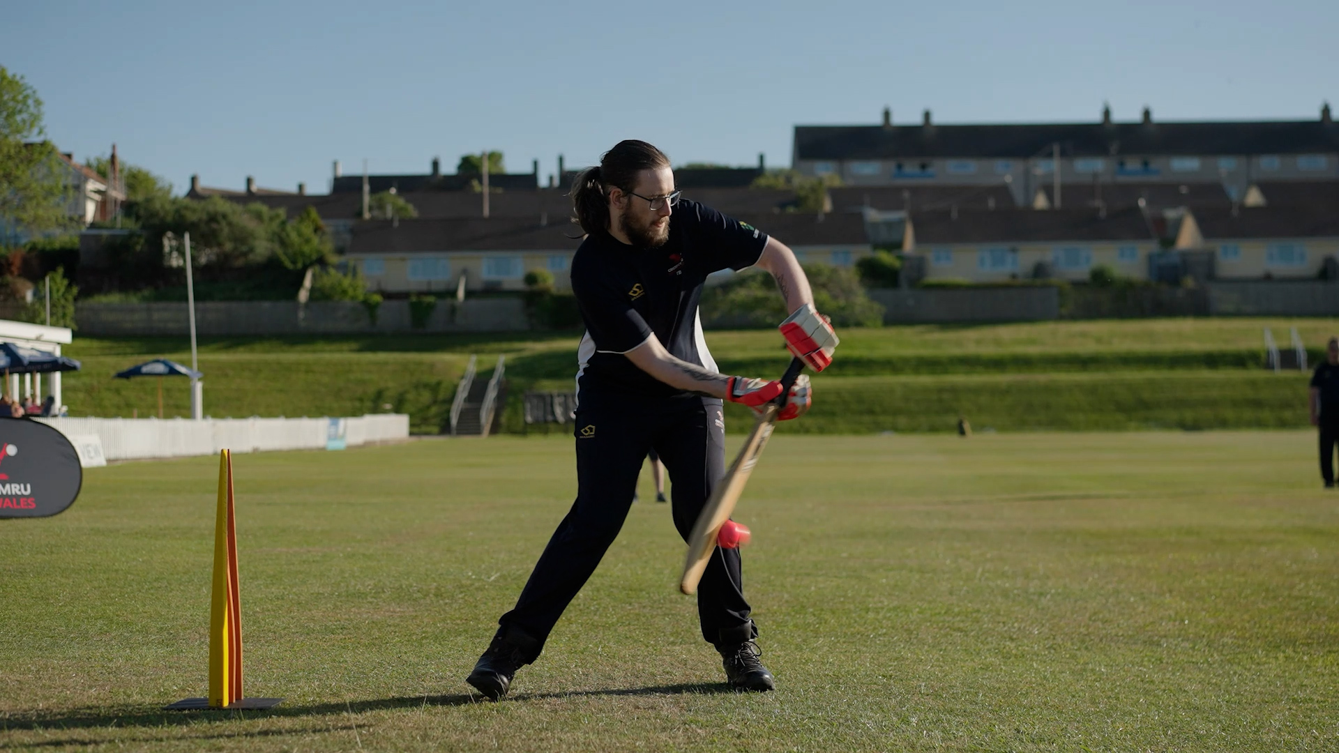 inclusive cricketer mid batting shot.