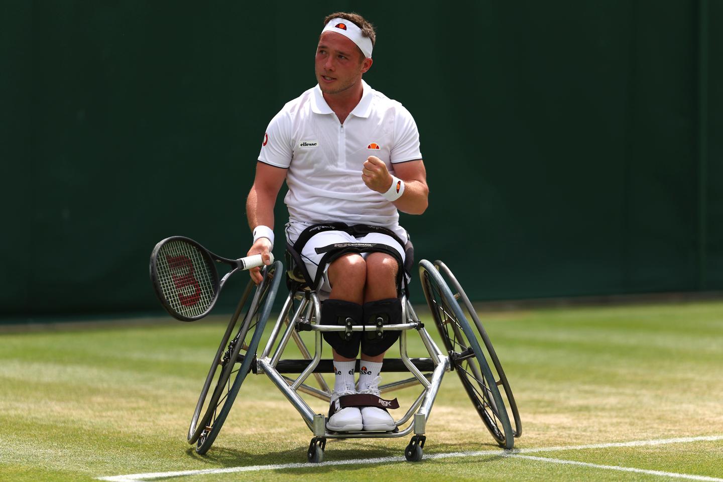 Alfie Hewett, wheelchair tennis athlete, celebrating post shot at Wimbledon 2023