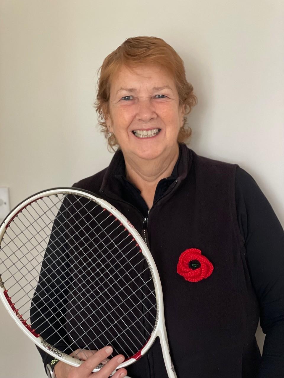 A picture of Dawn Williams holding a tennis racket