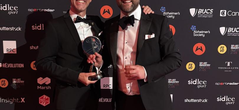 Every Body Moves members, Barry and Baden, collecting the Sport Industry Award prize for Sponsorship With A Social Purpose