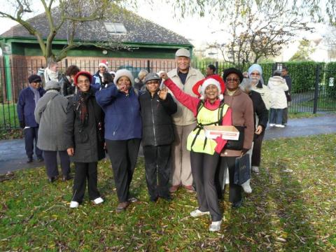 Walking group team photo with Christmas hats