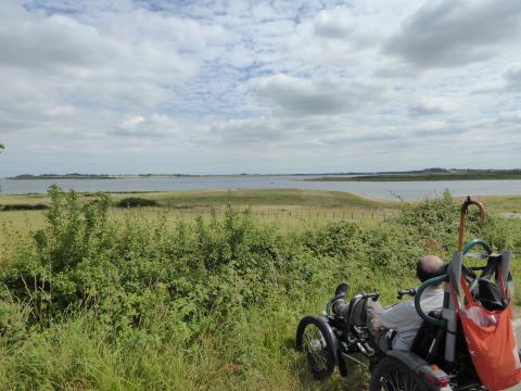 man on BOMA looking over fields