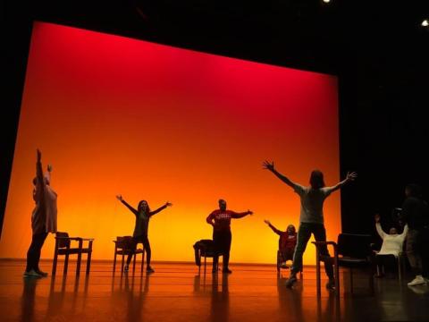 Brain injury survivors rehearse a dance routine.