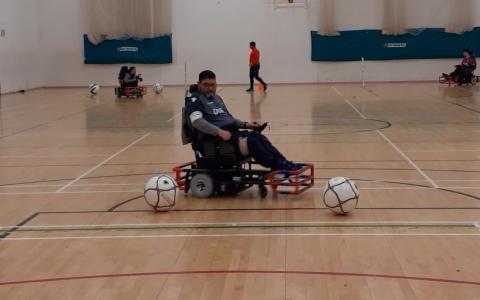 Powerchair football player during training