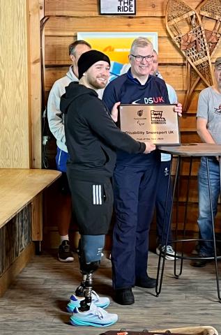 club of the year trophy presentation, with billy monger congratulating peter thorpe from winners, DSUK 