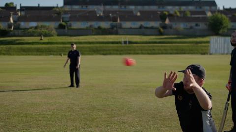 cricket ball catch - action shot