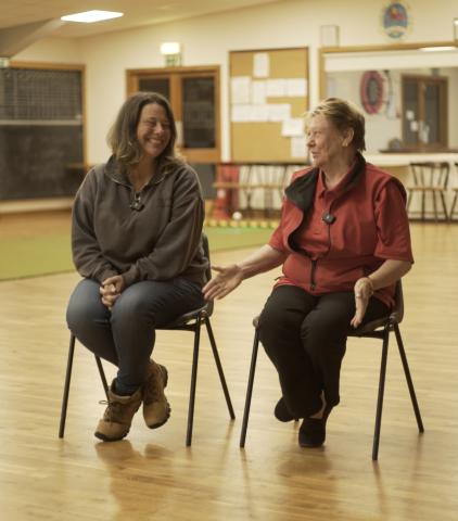 mother and daughter petanque players laughing together