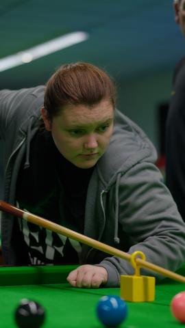 Sensory snooker - hoop rest Adaptive snooker player using a hoop based rest to facilitate their shot