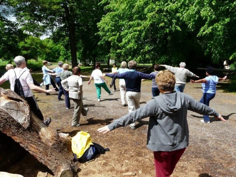 Group of walkers stretching before the walk