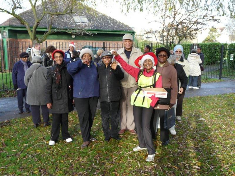 Walking group team photo with Christmas hats