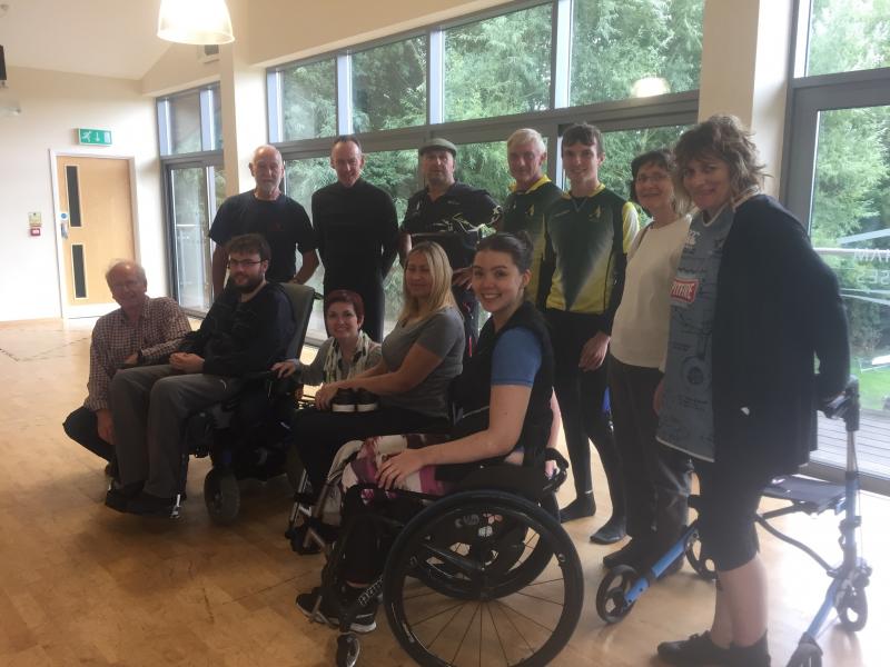 A group of disabled people visiting Norwich Canoe Club