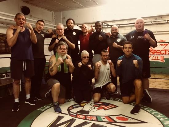 Group picture of blind veterans taking part in blind boxing class