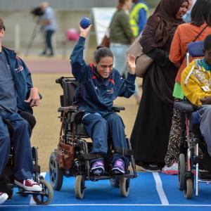 Person in a wheelchair playing Boccia