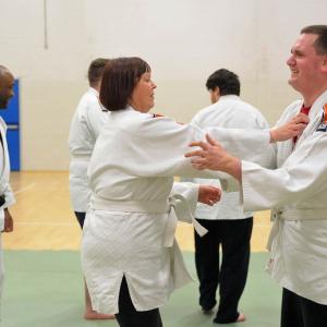 A group of people practicing judo
