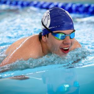 male swimmer smiling