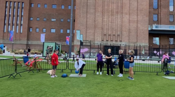 The Club of the Month winners trying out goalball at the battersea power station fanzone